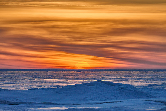Sunset over frozen Lake Ontario, 2025-03-10