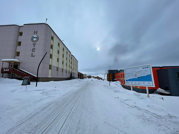 The main street, with the power plant in background