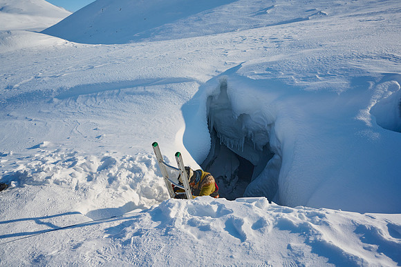 Climbing into the Ice Cave