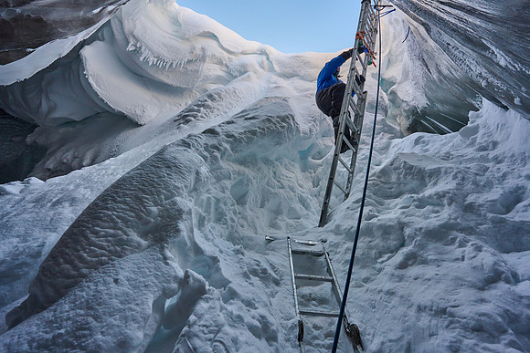 Climbing into the Ice Cave